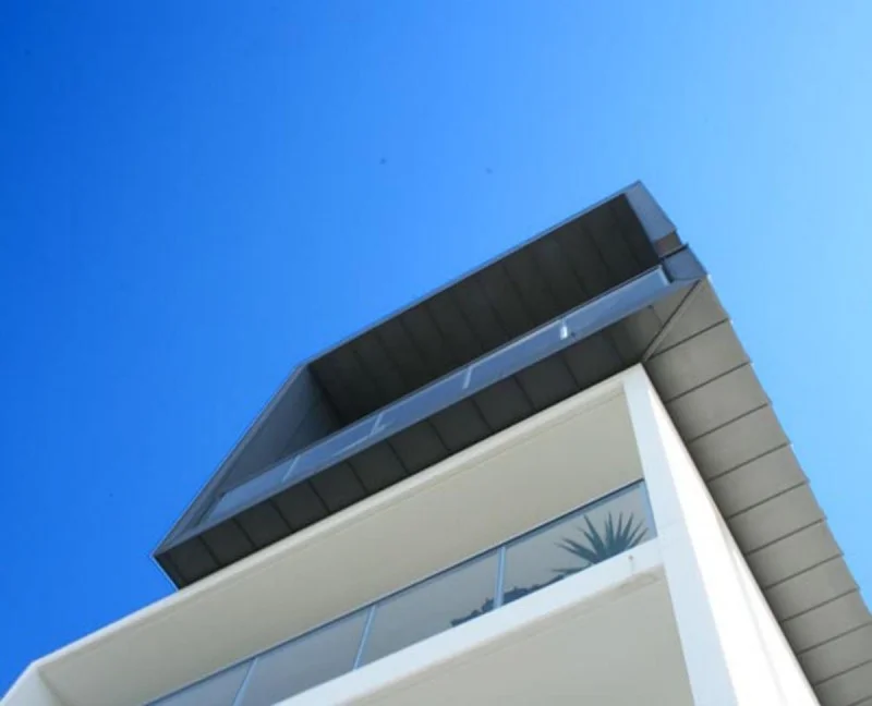 stunning-design-exterior-main-beach-house-in-modern-bottom-view-showing-also-blue-clean-sky-at-sunny-daylight.jpg