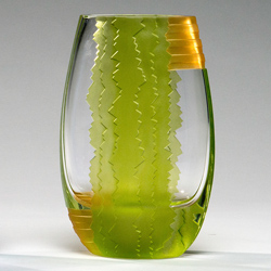 Linda Wingate Glass Art As a three dimensional, multi-media glass artist, I start with the highest quality hand blown crystal forms. I encapsulate each piece with a rubber resist, hand draw a design, then I sandblast, carve, cut, and clean the piece to conclude the process. The addition of paint, stains, and other elements of glass in some of my pieces adds balance to its more formal elements and creates a sense of texture on the smooth, clear, surface. Visit Artist's Website