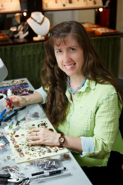 Susan Crane Mixed Media Jewelry Welcome to "A Crane Creation"—where polymer clay, fused glass, chainmaille, beads, found objects, metal work, resin, photographs, wire crochet, passion and play join together in fabulous jewelry art and couture home dècor. The aesthetics range from: whimsical to elegant; O'Keefe to Mondrian; a whisper to a shout. By teaching jewelry-making classes, I also have the pleasure of supporting others as they explore their creativity in a fun, supportive environment.