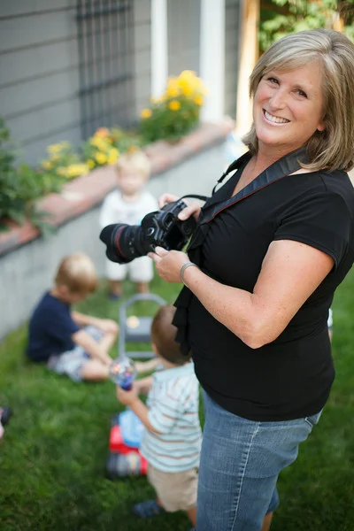 Kathy Daly Photography I am loving my second career after spending over three decades as a high school yearbook and English teacher. One of my favorite subjects to teach was photography, especially as it applied to journalism. Now I concentrate on photographing individuals and families (especially children) as well as special occasions. I also instruct small groups about how to use their own DSLR cameras. Visit Artist's Website