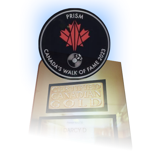 A Prism Canada Walk of Fame 2023 badge and a certificate for Darcy D for Canadian Gold.