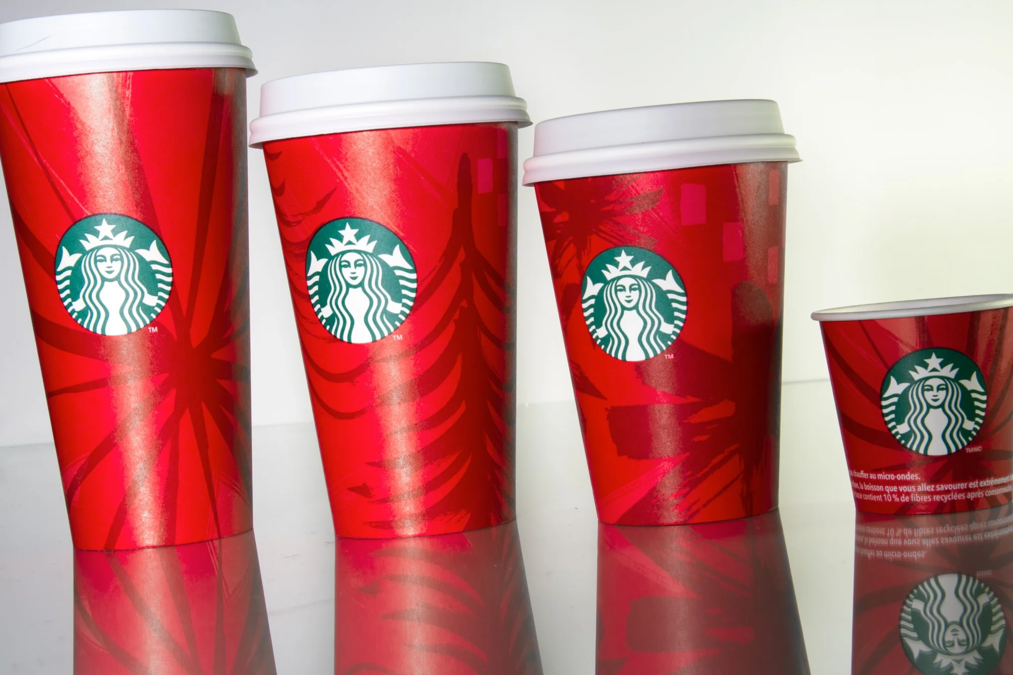 These...fairly abstract images of trees and snowflakes and possibly stars, who knows, are the right way to honor Jesus. And openly honoring Jesus is the only way a large conglomerate can avoid oppressing loud-mouthed members of the country's most prominent faith.