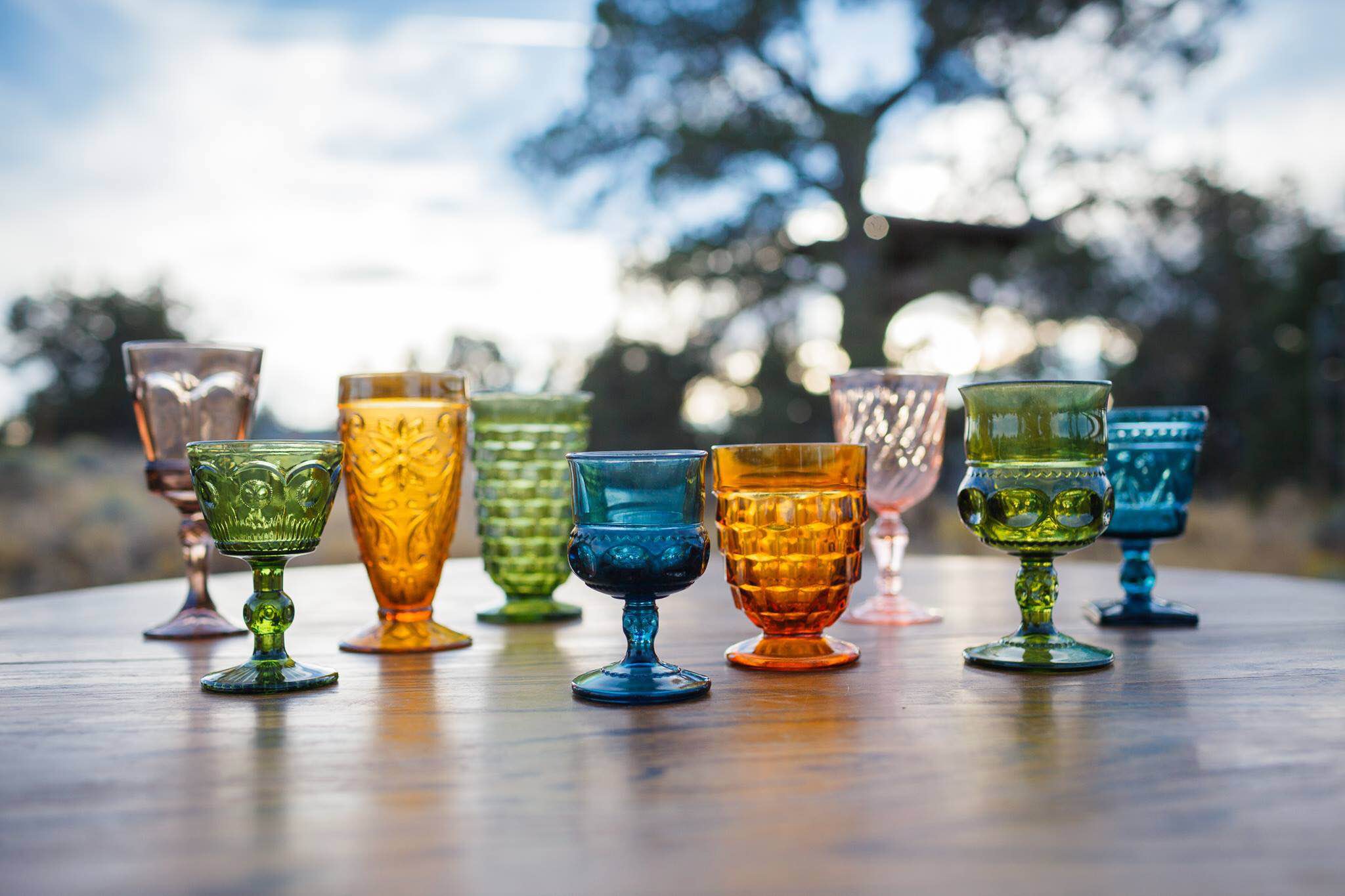 Pressed glass goblets assorted colors, shapes, and sizes.JPG