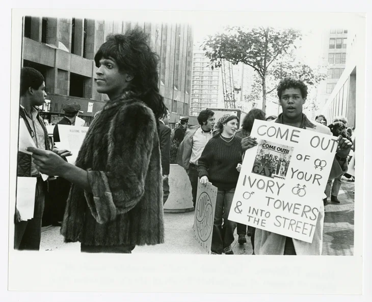 Diana Davies Untitled (Marsha P. Johnson Hands Out Flyers For Support of Gay Students at N.Y.U.), c. 1970 Digital print, 11 x 14 in. © The New York Public Library/Art Resource, New York.