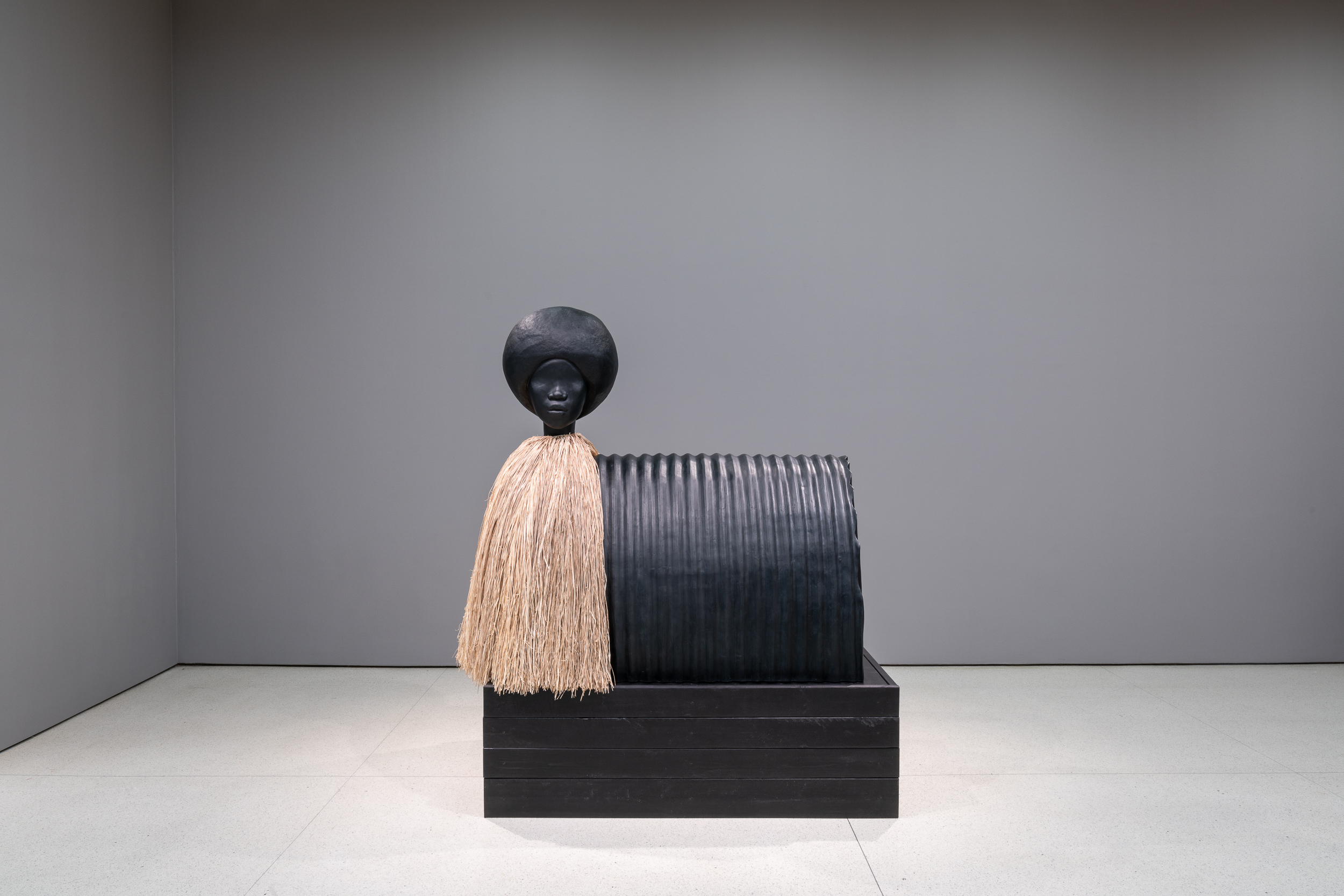  Simone Leigh  Sentinel , 2019 Bronze and raffia, 198.1 x 166.4 x 102.9 cm Courtesy the artist and Luhring Augustine, New York Installation view:  The Hugo Boss Prize 2018: Simone Leigh, Loophole of Retreat , Solomon R. Guggenheim Museum, New York, A