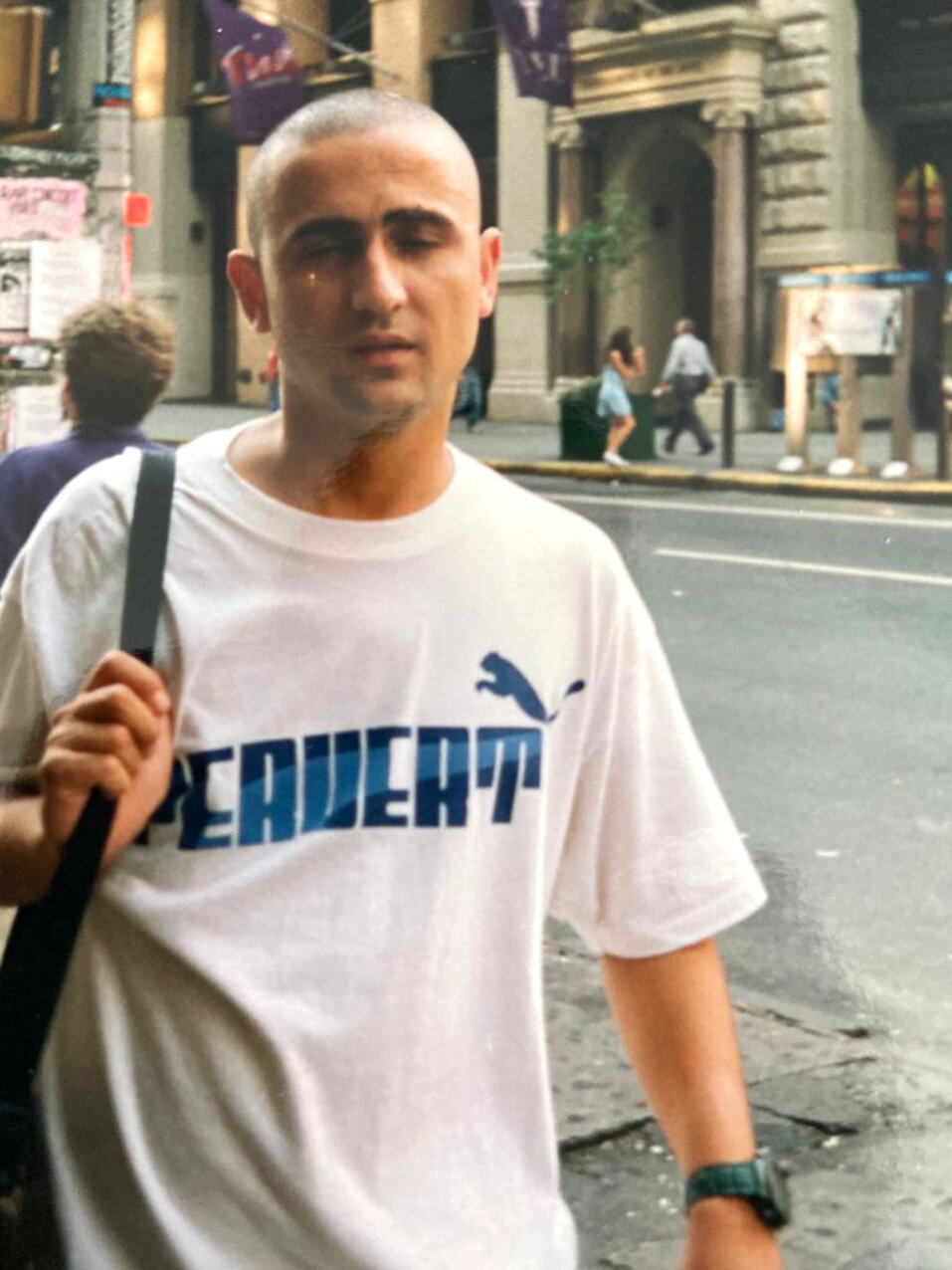  1993 NEW YORK LUCA BENINI LUCA BENINI WEARS A PERVERT T-SHIRT DURING A WORK TRIP IN NEW YORK IN 1993.  