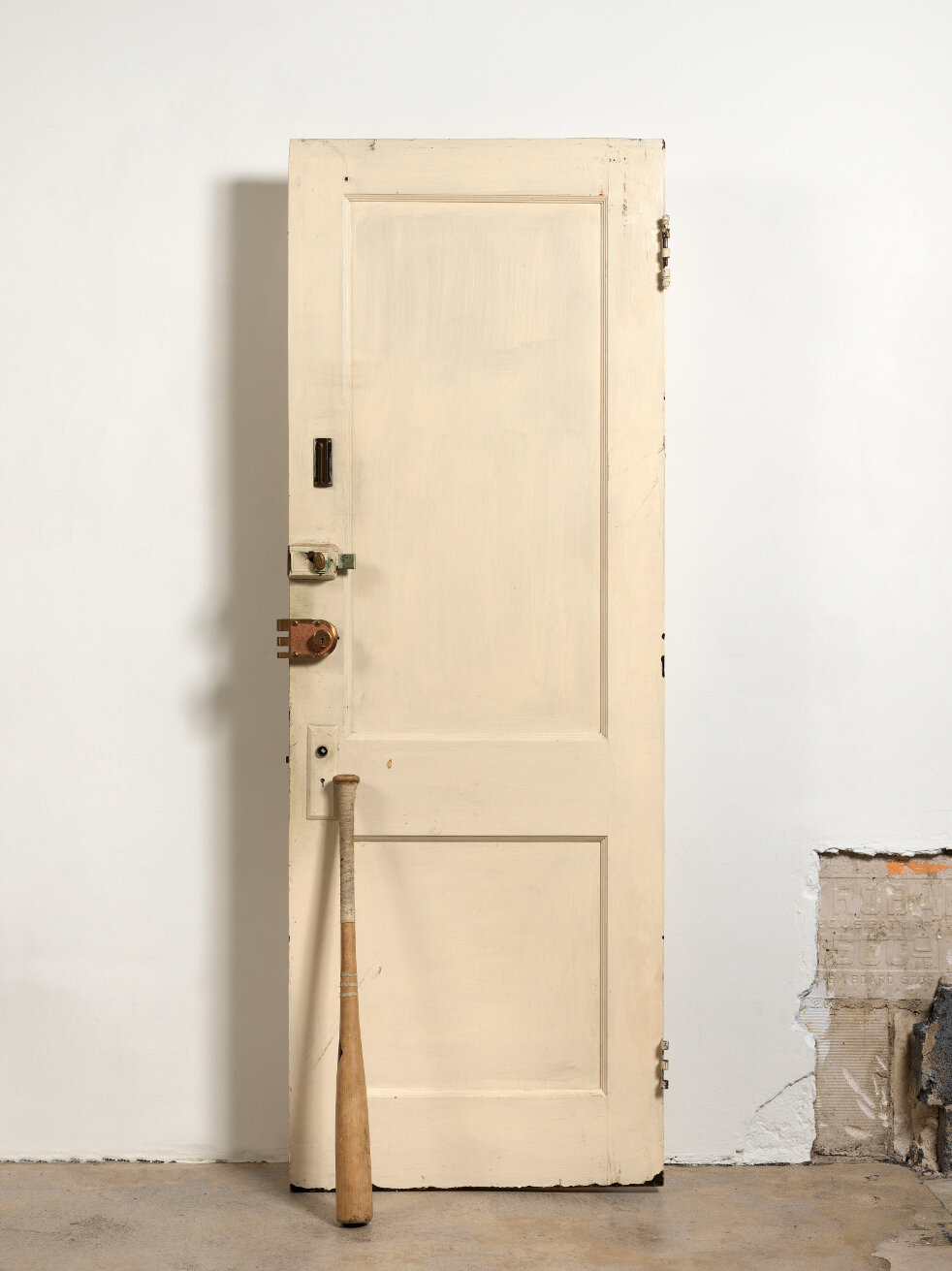  Diamond Stingily  Entryways , 2016 Door with locks, bat 79 x 25 in (200.7 x 63.5 cm).  Collection Dr. Gerardo Capo.  Courtesy the artist and Queer Thoughts, New York 