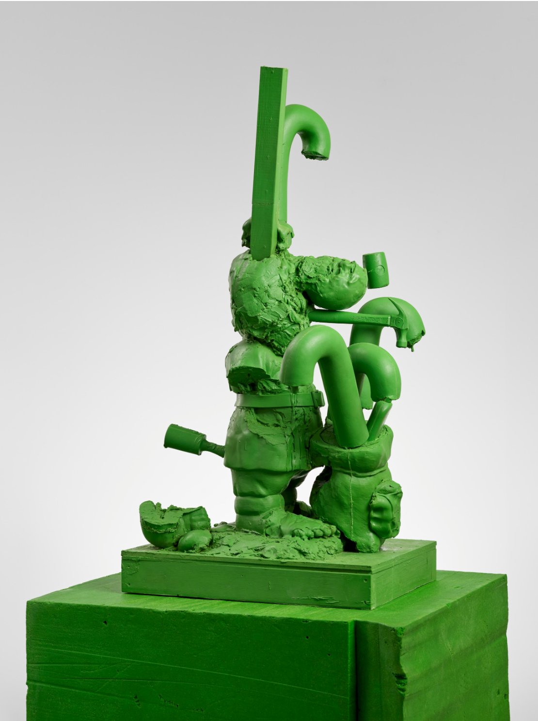  Paul McCarthy  Santa Candy Cane  (2004) carbon fibre (green) 53 1/2 x 25 1/4 x 27 3/8 in.&nbsp; pedestal: 41 x 33 1/8 x 29 in 