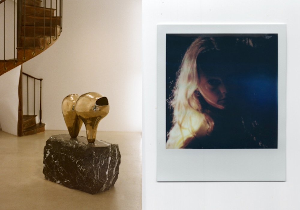   LEFT  Katharina Kaminski  Telescopio Invertido  (2023) Bronze + marble 60 x 40 x 160 cm  RIGHT  Image courtesy of Hanne Gaby Odiele Photography by Anthony Ferrara 