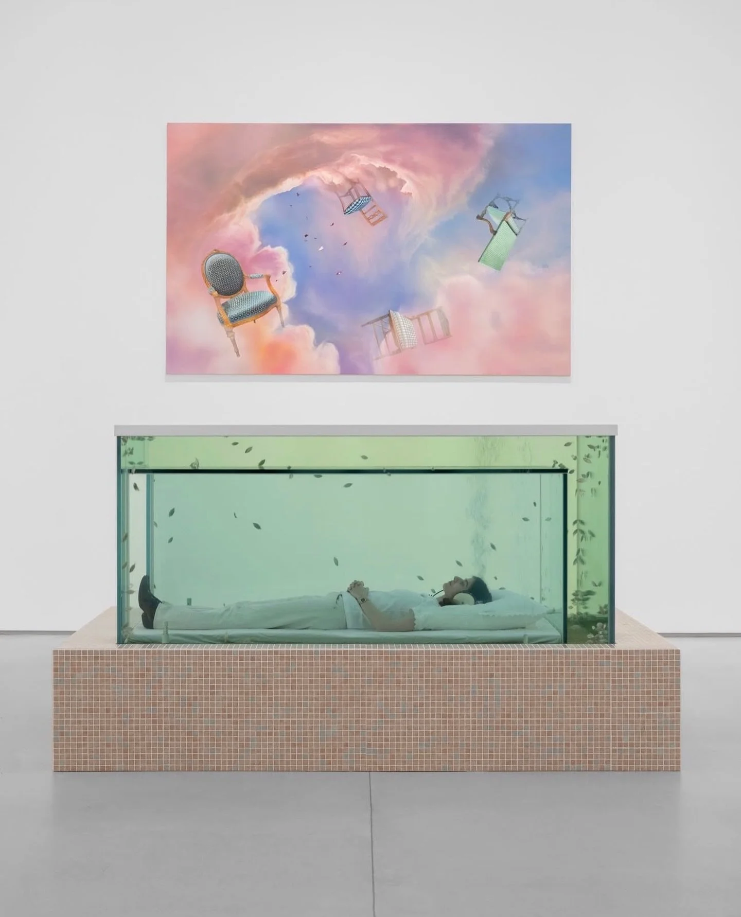Spooky action at a distance. @arianapapademetropoulos explores quantum mechanics and self help in her new exhibition Glass Slipper at @thaddaeusropac in Paris. The center piece, a sculpture entitled Water Based Treatment,  is an interactive aquarium 