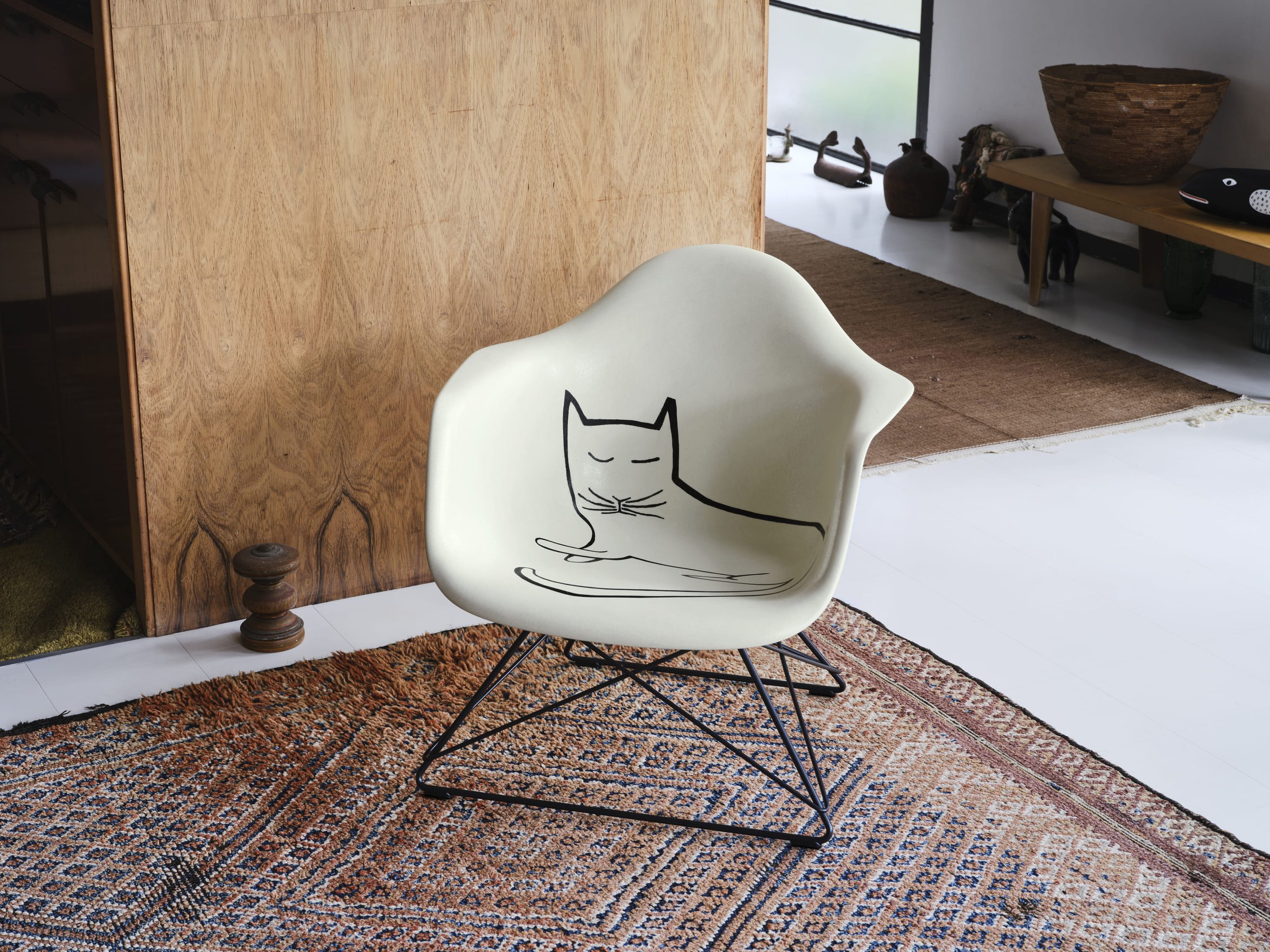 Herman Miller x Vitra Announce A Limited Edition Eames Fiberglass Armchair with Cat Autre Magazine