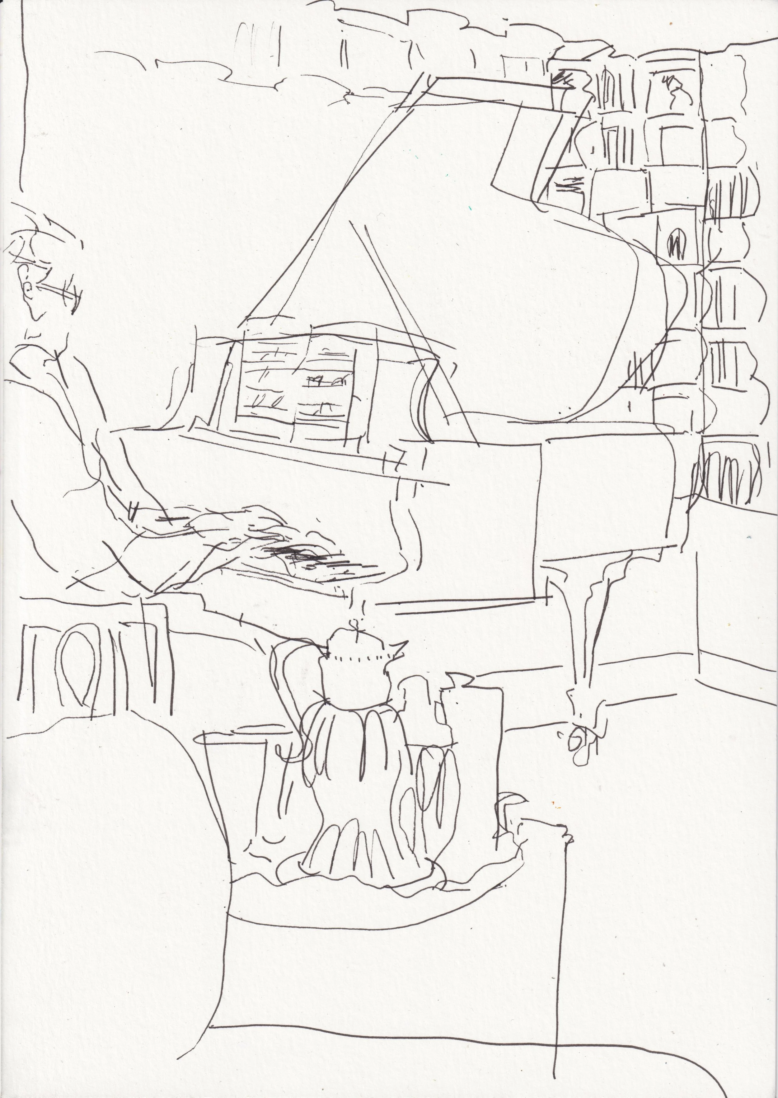 Kristof Playing Piano.jpeg