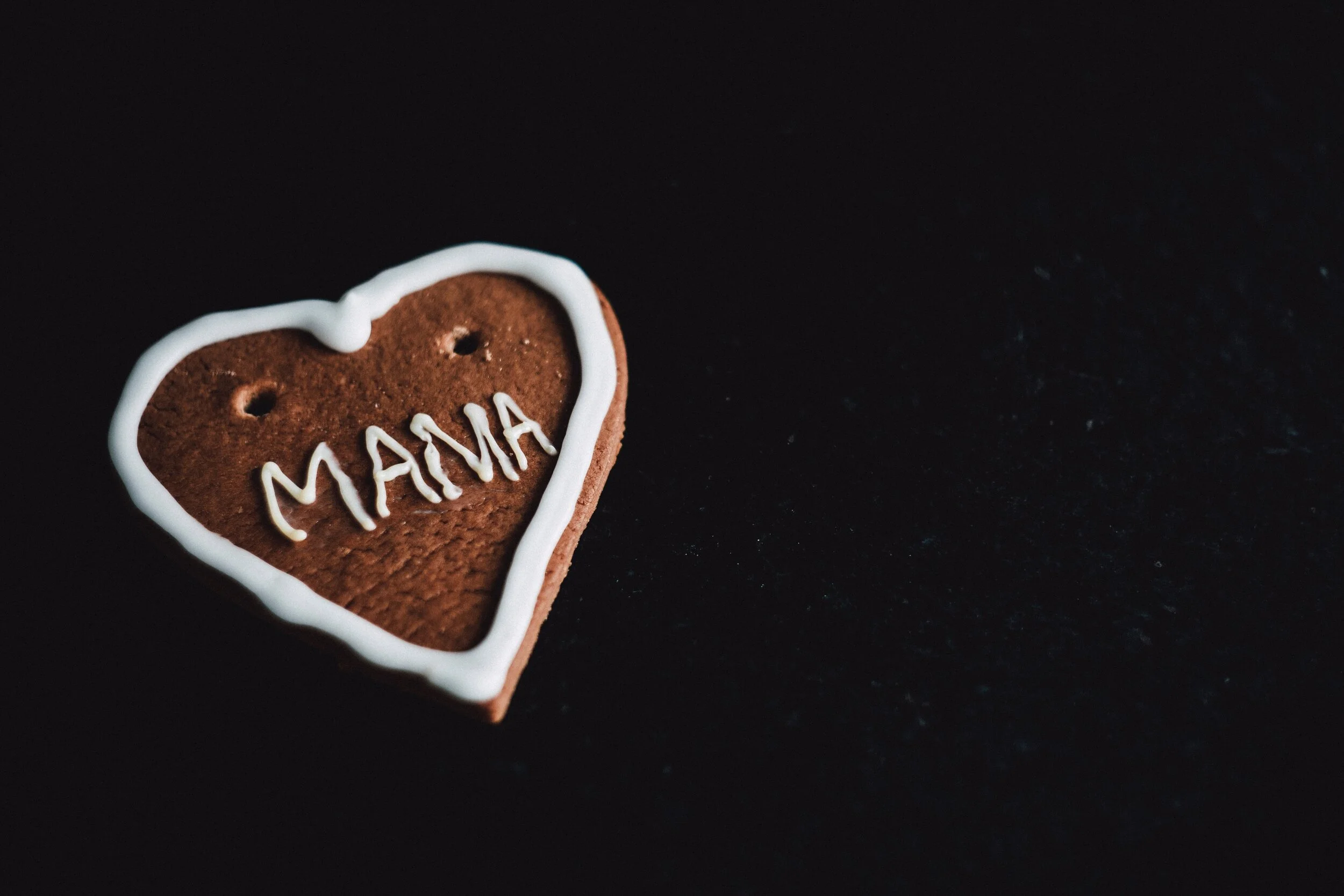 photo of cookie with “mama” decoration