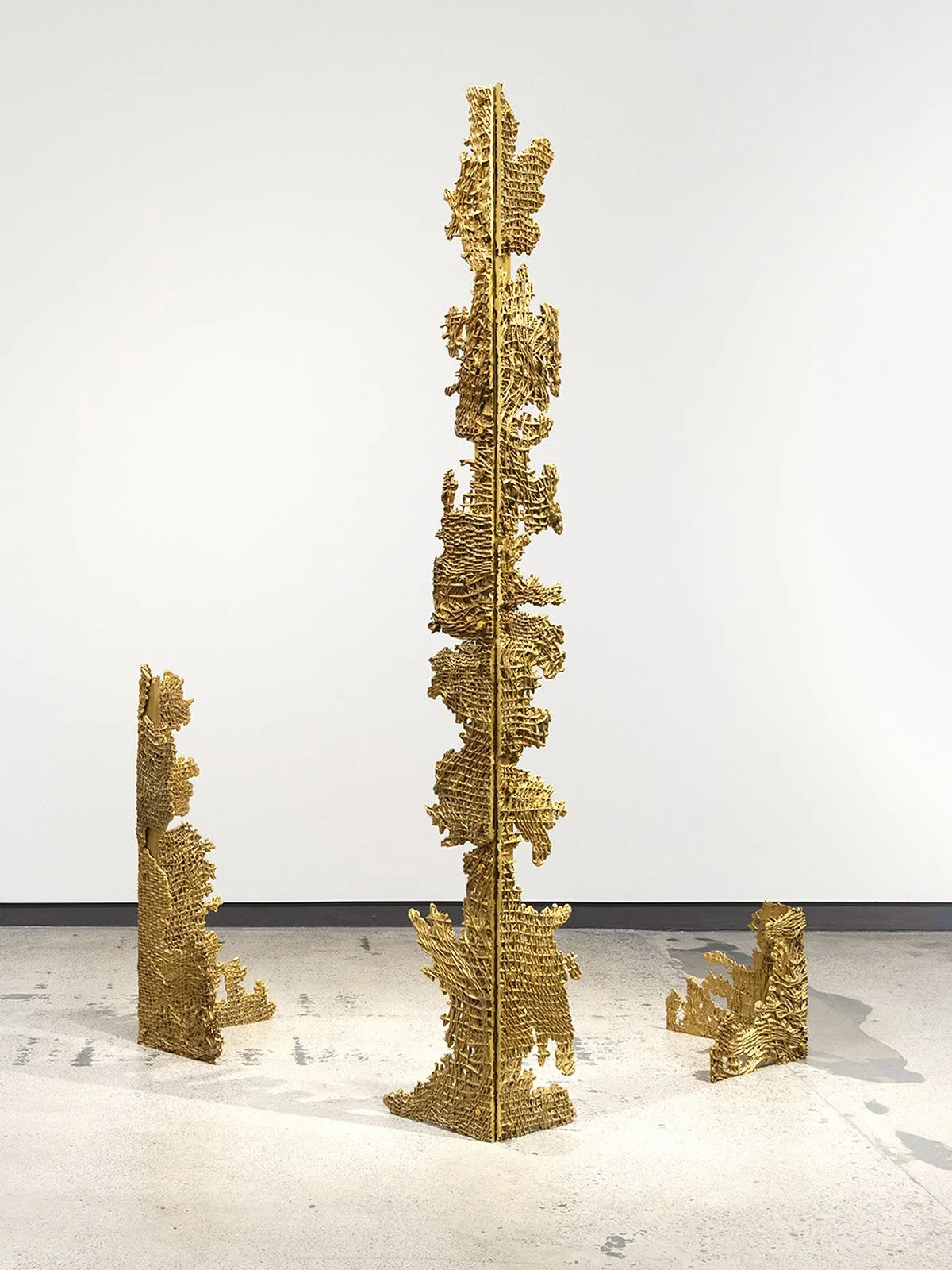  FRAGMENTED BRASS PILLAR 2  FRAGMENTED BRASS PILLAR 1  FRAGMENTED BRASS PILLAR 3  (left to right) Brass casting  36 x 18 x 12 in,  74 x 13 x 11 in,  14 x 15 x 16 in,  2025  + more details  