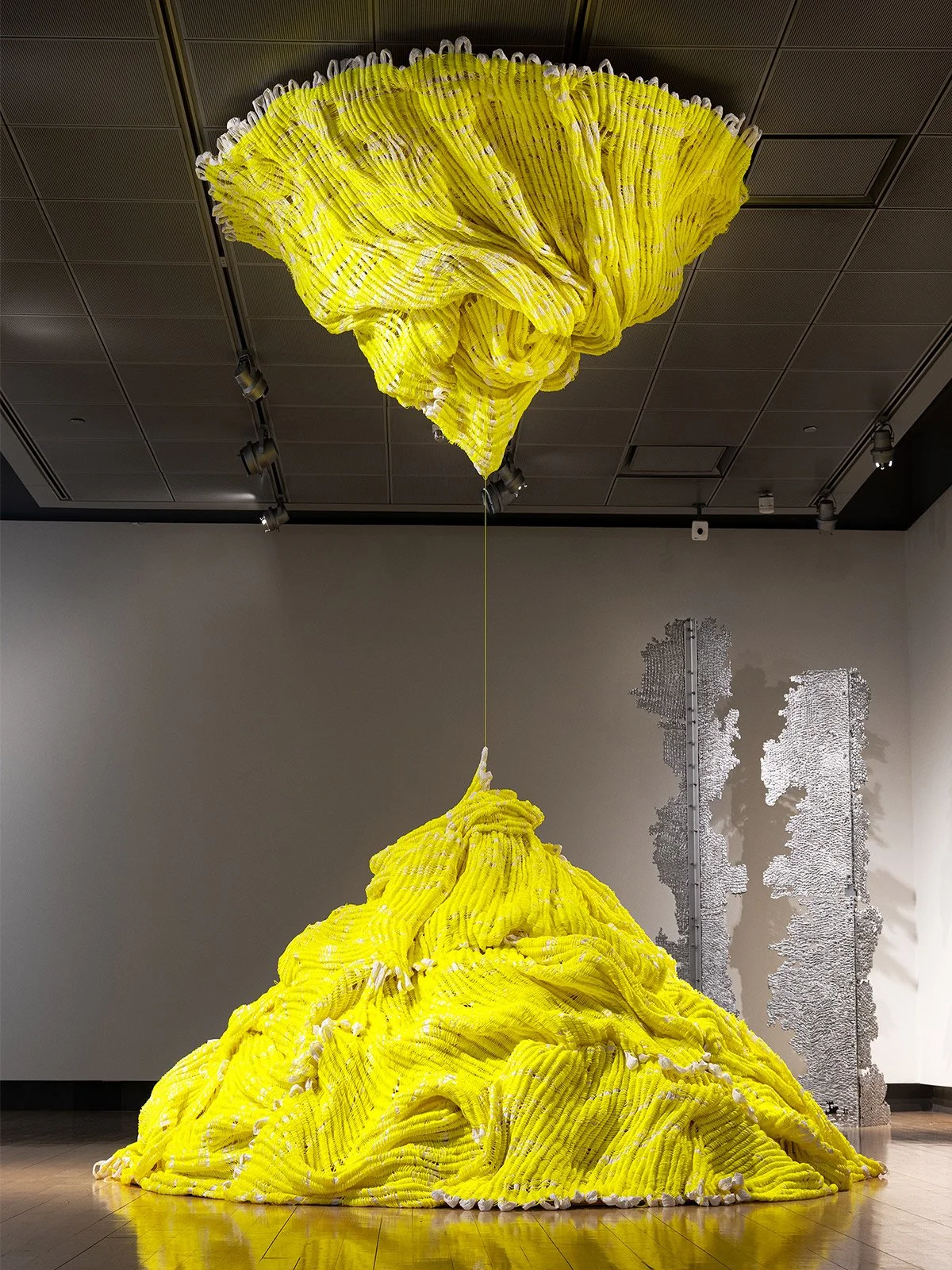  RESONATE WITH  Poly cord, paper and plywood  120 x 106 in diameter  2023  Site-responsive installation  + more details  