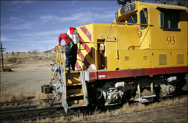 Santa Claus rides the train