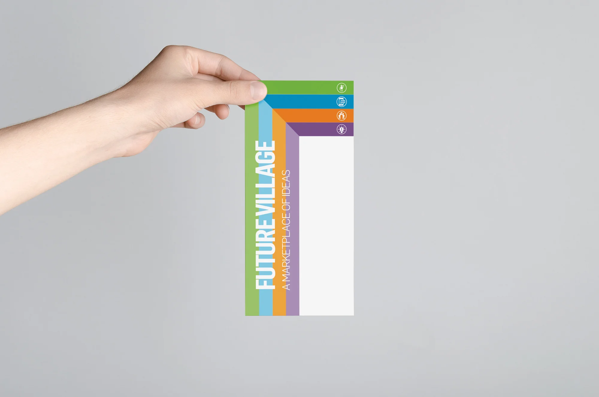 Future Village Brochure Front Hand.jpg
