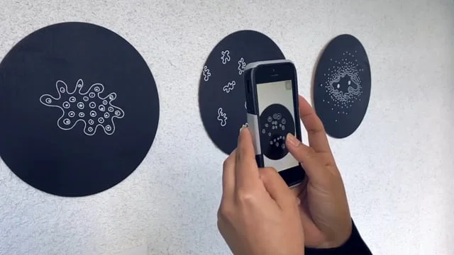   Portals , 2019,  Wood, Silkscreen, AR Software  (3) 11.5” inch Wood Disks, Limited Edition 12 + 2 AP    Portals  is an augmented reality installation. Wood disks silkscreened with abstract biomorphic forms are dormant until viewers interact with th