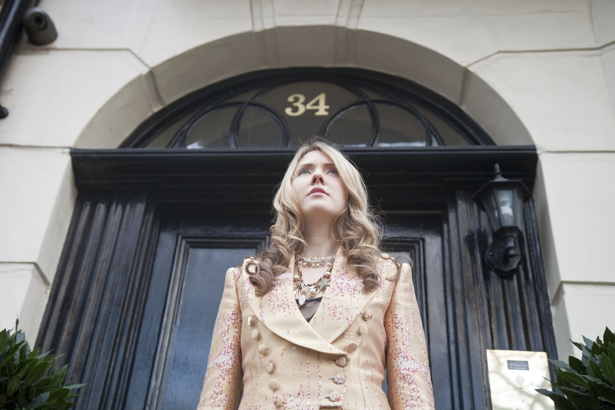 12. Beatie Wolfe in her Musical Jacket outside 34 Montagu Square 3 - Photo by Ollie Smallwood.jpg