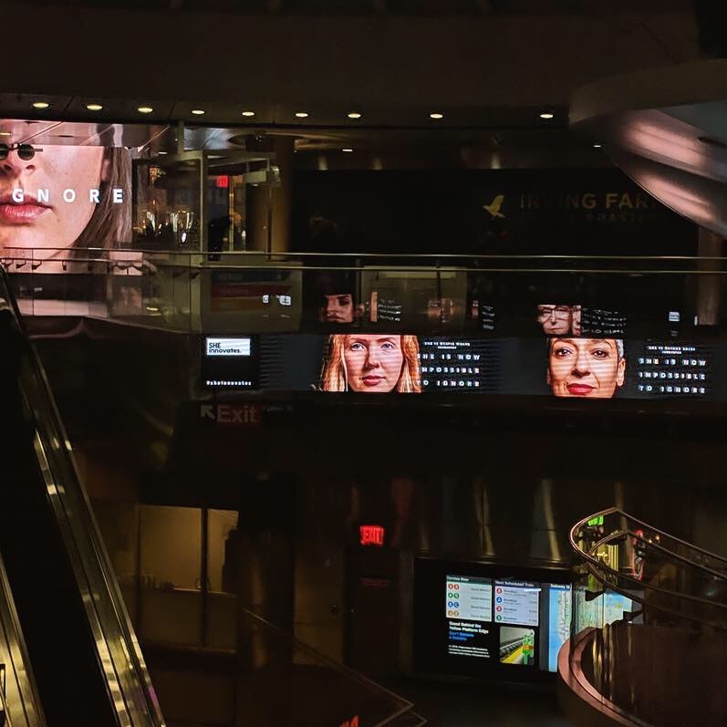 NYC Fulton Station main concourse ft Beatie Wolfe and co in UN campaign.jpg