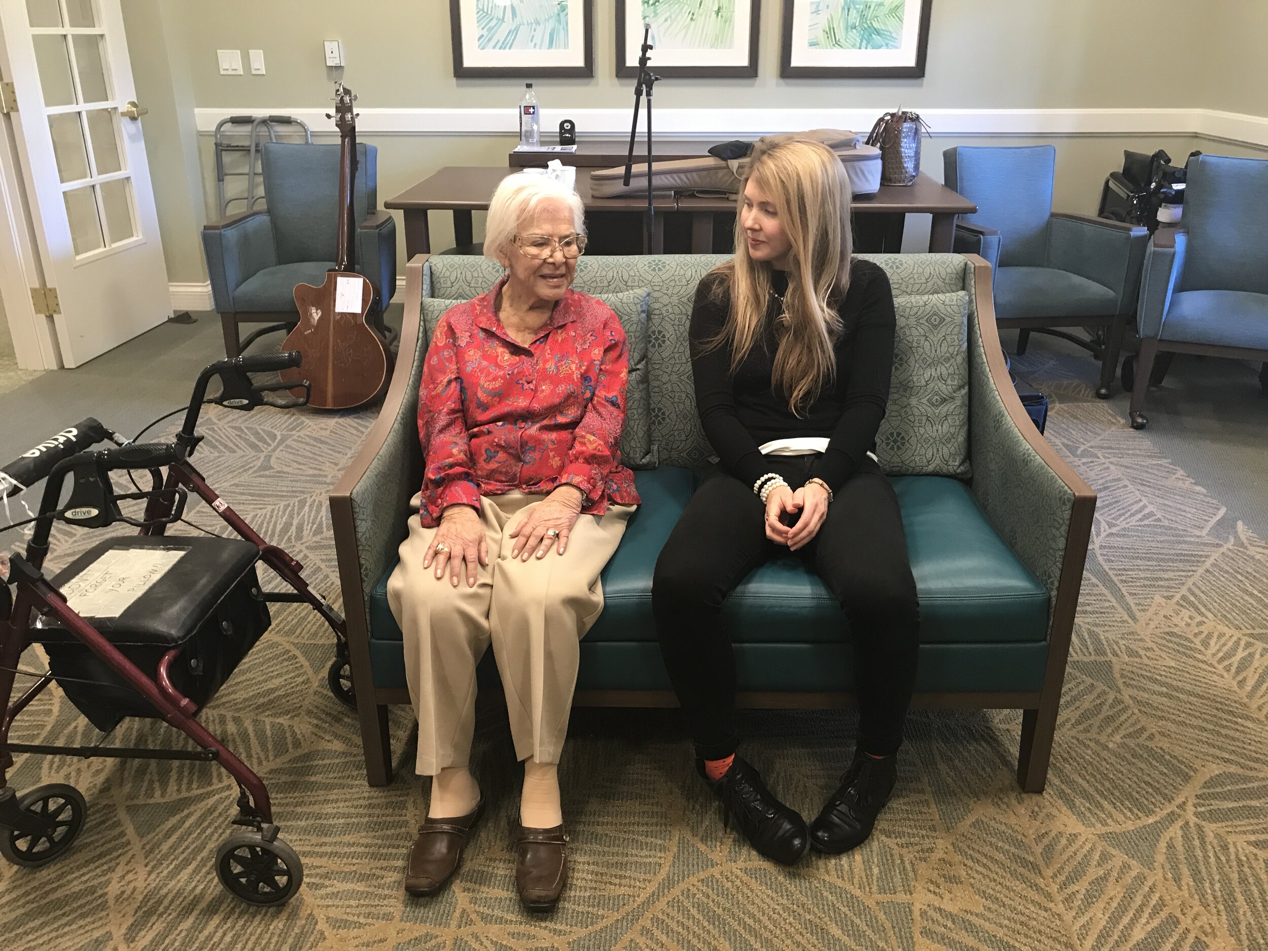 Beatie Wolfe with a resident post performance in San Diego