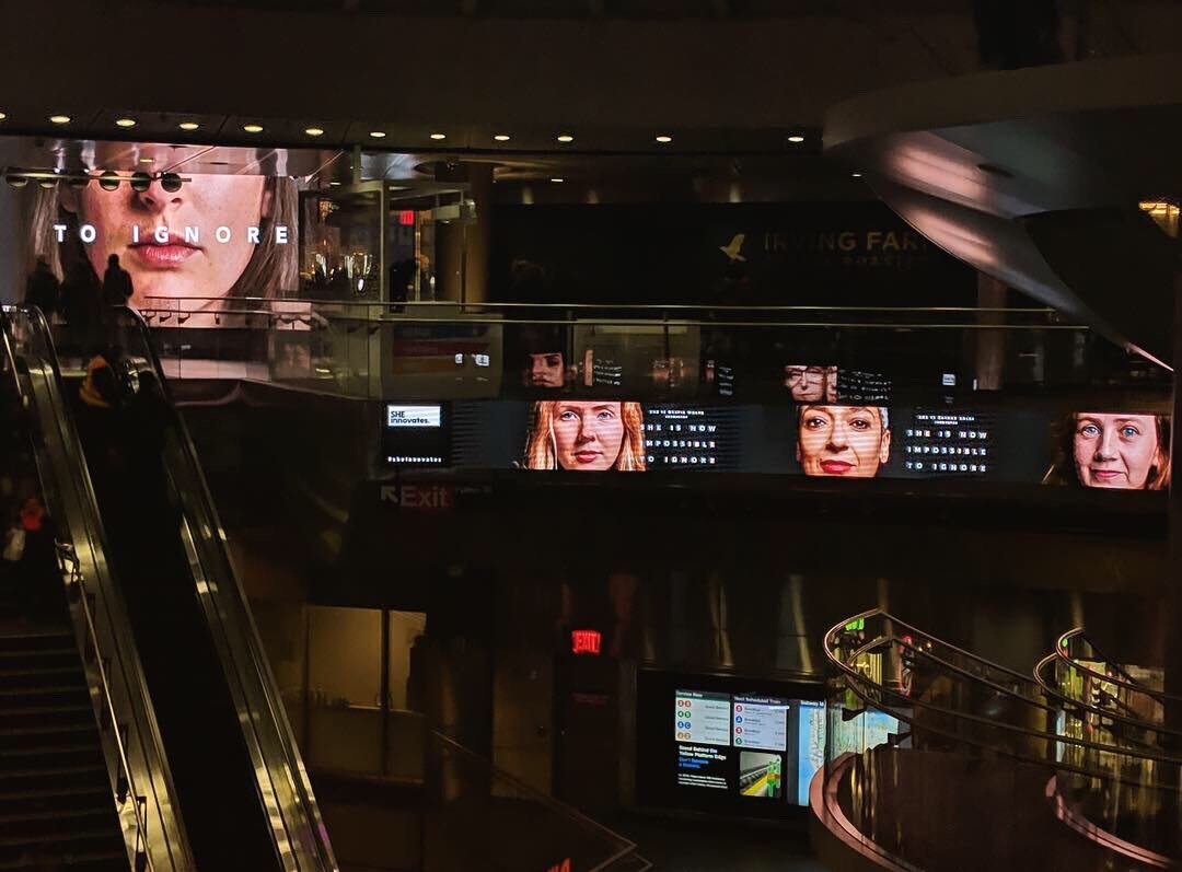 NYC Fulton Station main concourse ft Beatie Wolfe and co in UN campaign.jpg