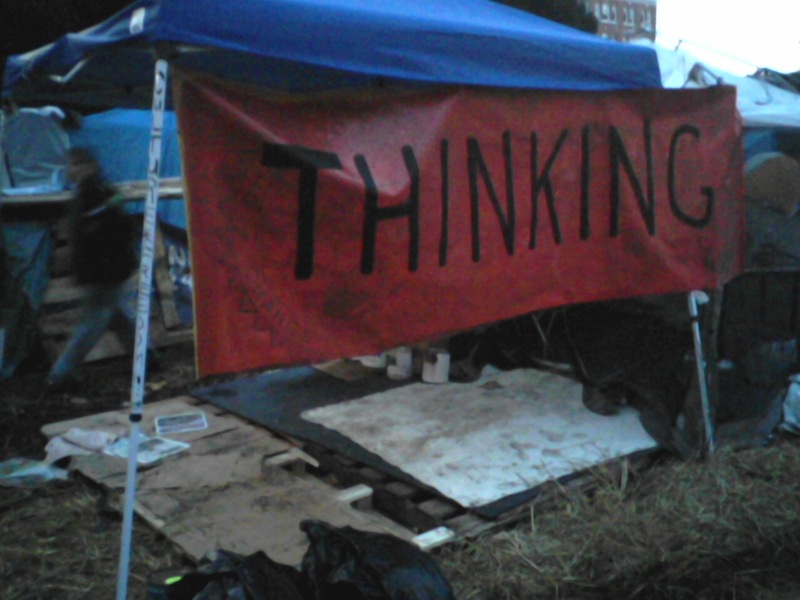 I set up an "art studio" at the camp to make protest signs, and made a second "Thinking" banner for it.
