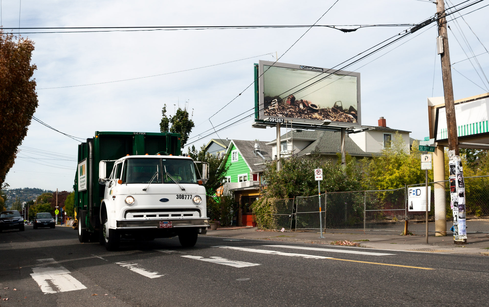 garbage-truck-and-garbage-billboard-on-division-street-web-.jpg