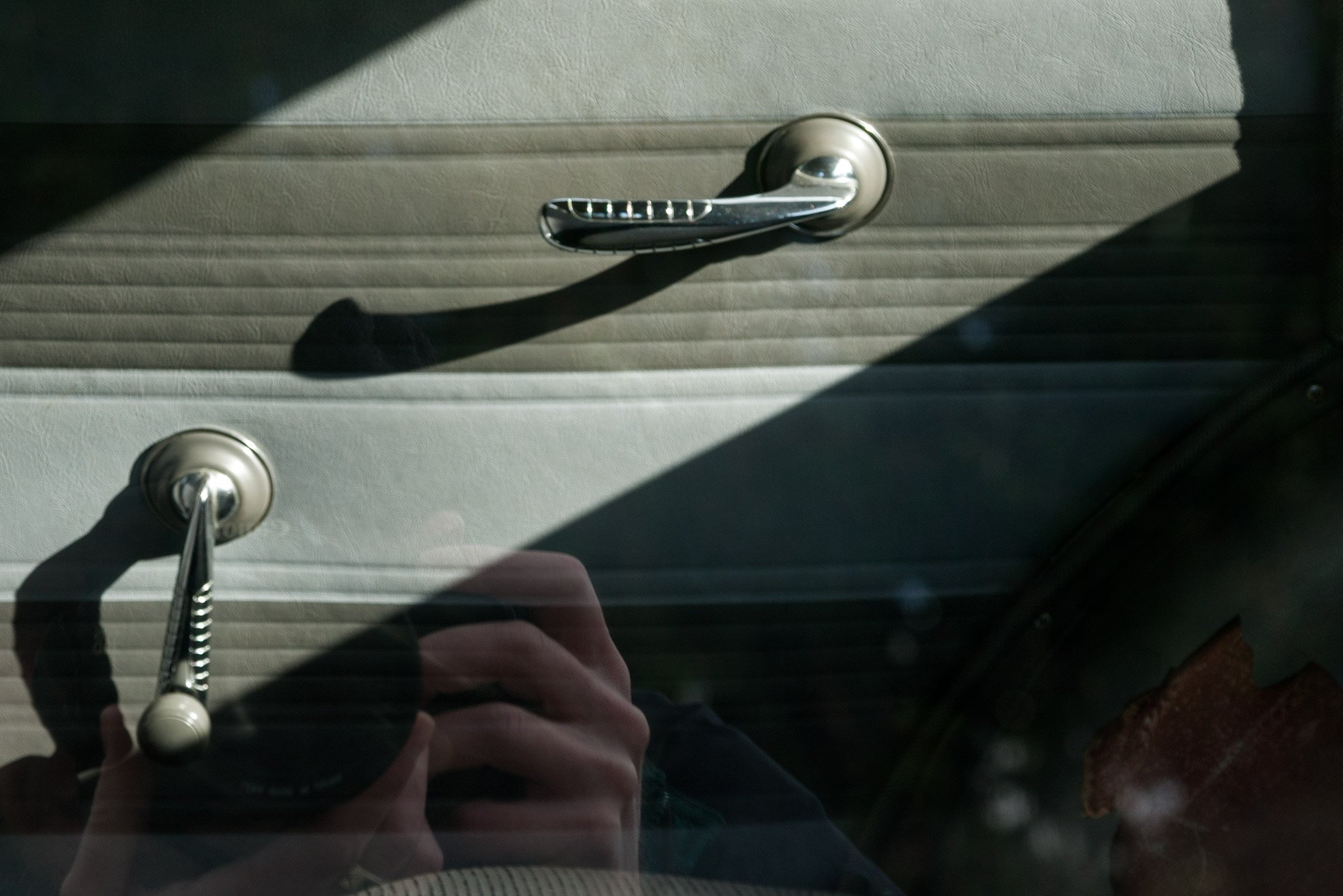 car-detail-sorta-self-portrait-with-camera-in-frame-.jpg