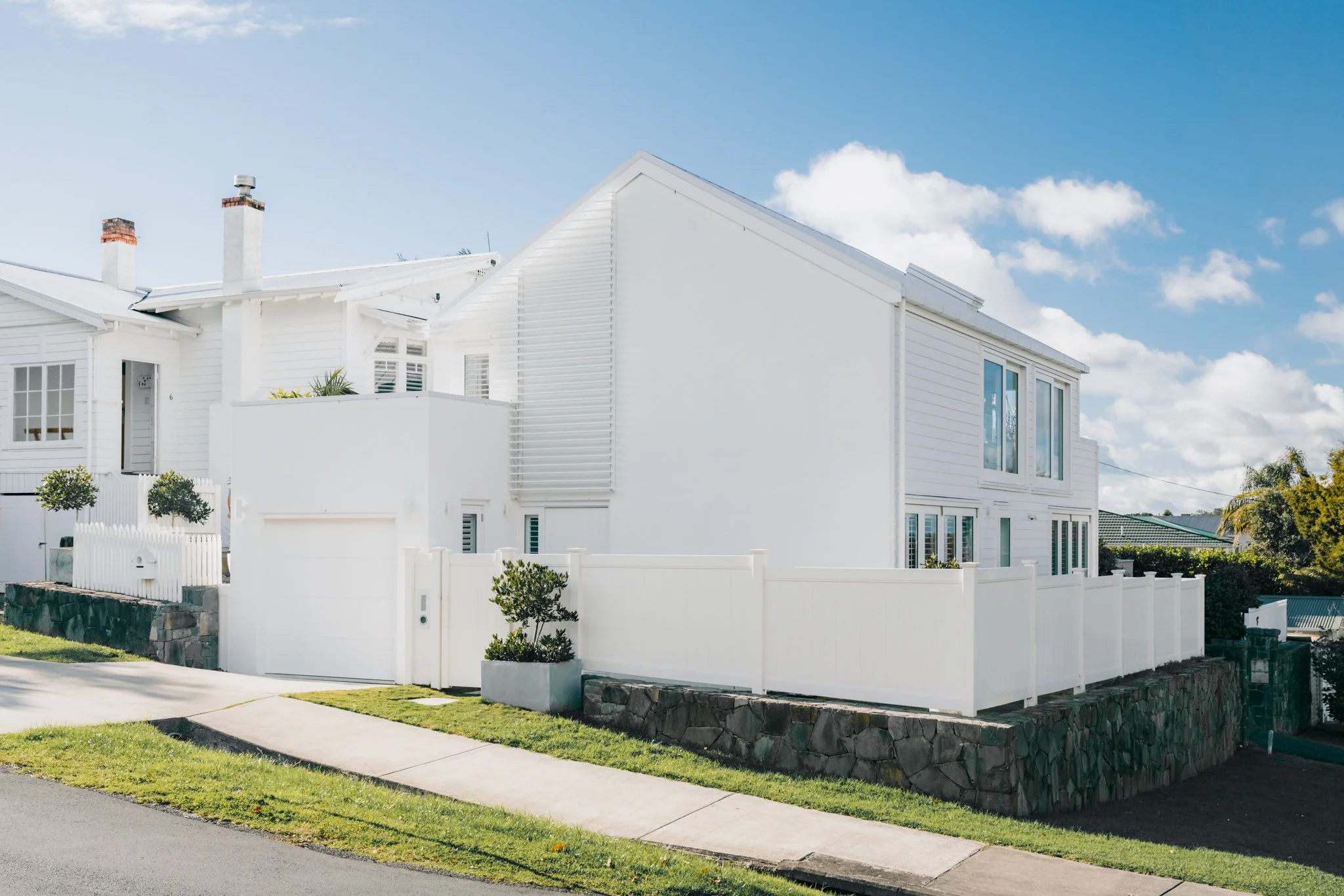 Northcote Point House, New-Build by Macfie Architecture, Auckland.Award-winning contemporary seaside new-build, designed as a subdivision to complement the neighbouring bungalow.