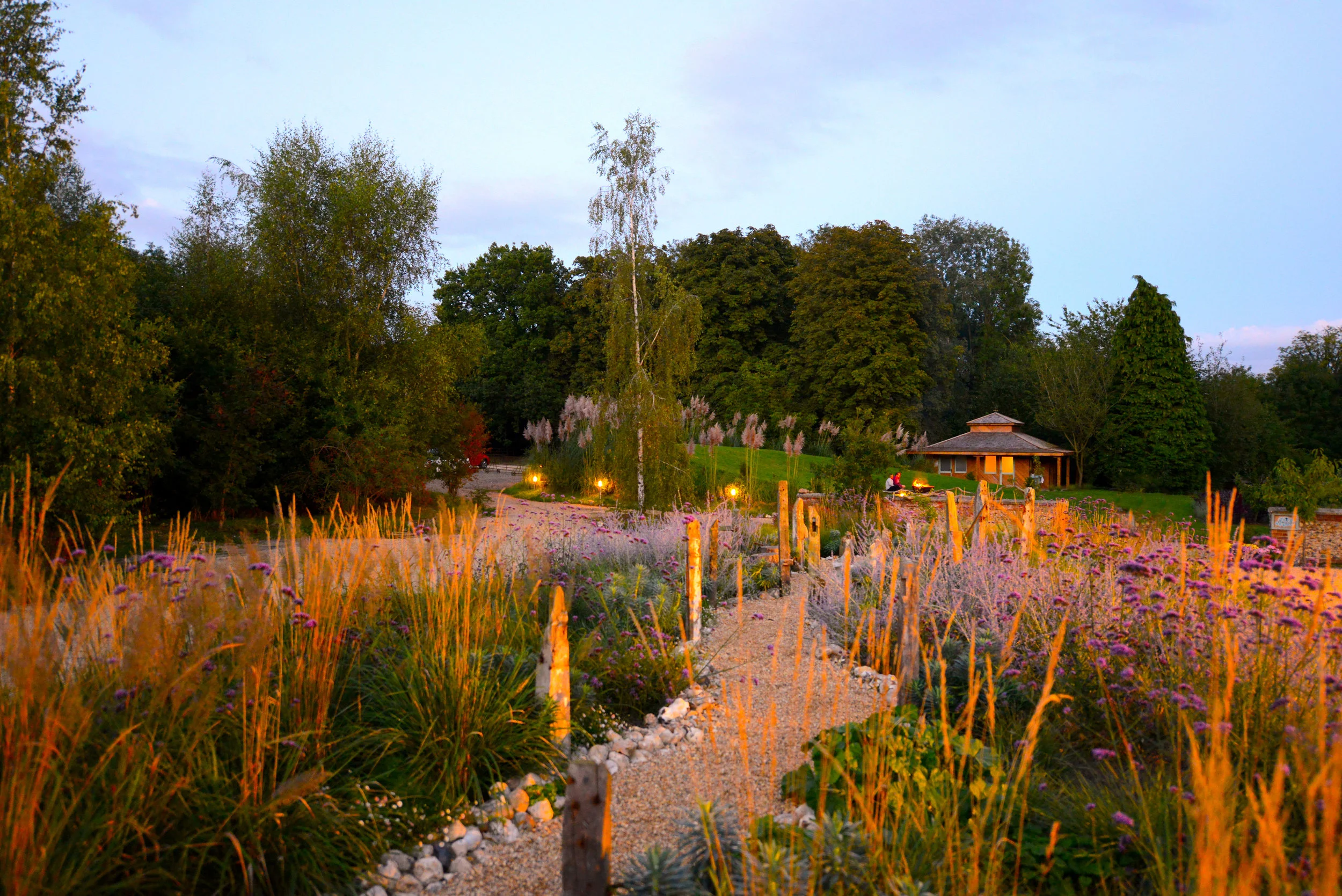 West Lexham gardens, stunning walks with wild flowers, bees, trees, vegetable gardens, a river to swim in. The perfect place to open hearts and minds to what's possible. 