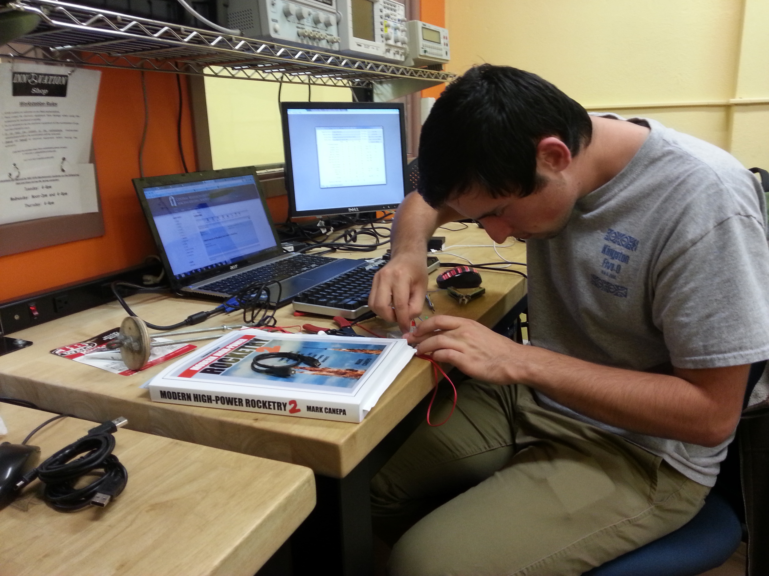 Our recovery expert Greg conducting static flight tests on the Raven altimeter. This test required the simultaneous use of both keyboards!