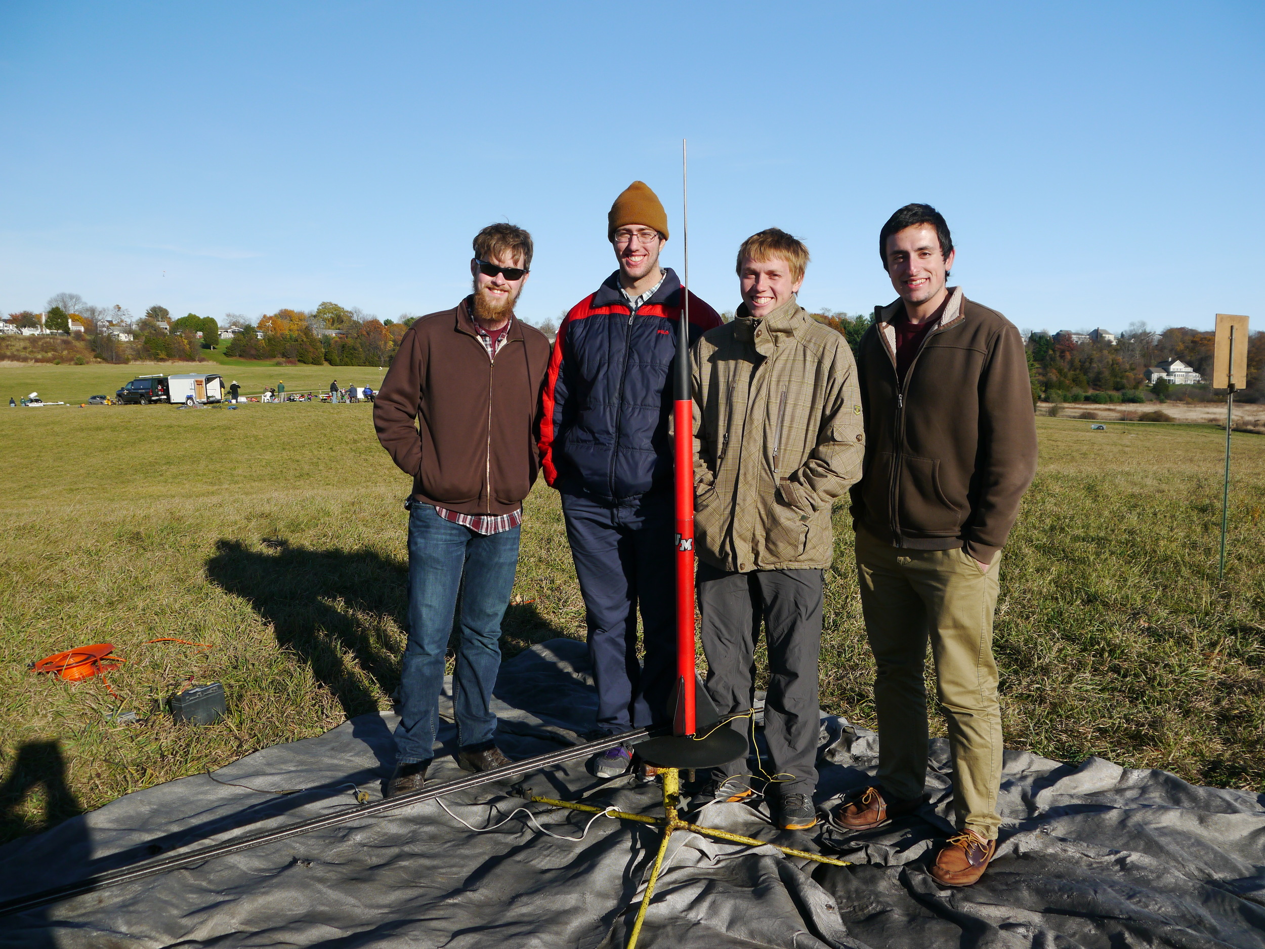 The UMass Student Launch Team with their first vehicle.