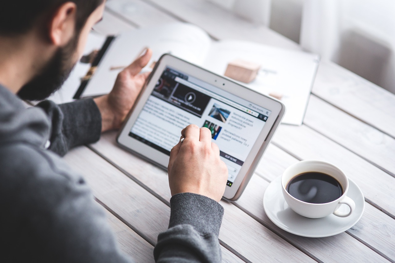 Photo Cred: https://pixabay.com/en/man-reading-touchscreen-blog-791049/