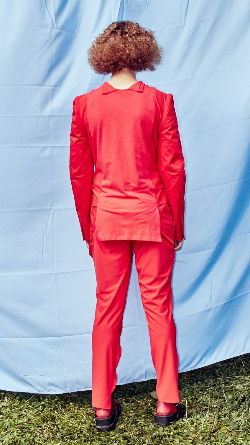 pvr-manifesto4-red-suit-back.jpg
