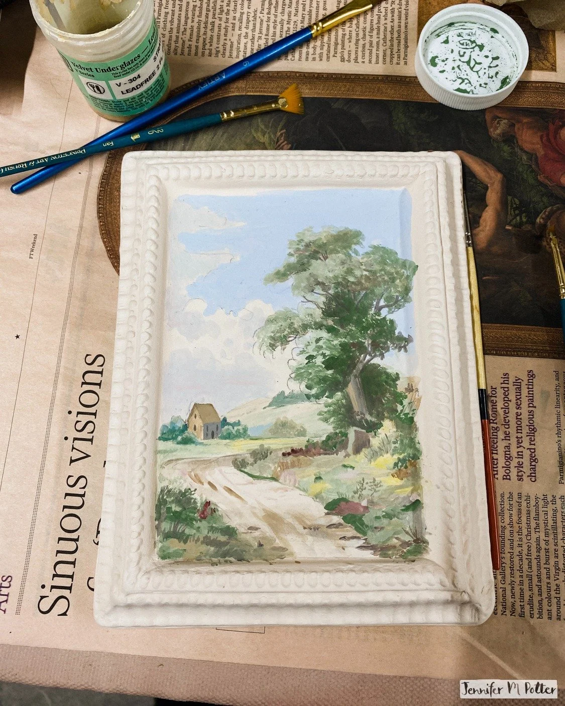 I got into ceramics to draw on three-dimensional forms, vases and bowls and such. Which makes it strange that I'm most drawn to this series of framed ceramic paintings. I create three-dimensional canvases just to paint on them in two dimensions anywa