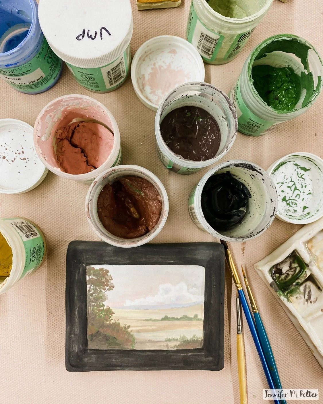 Underglaze is strange. It's like watercolor but also not at all. They share the same binder, but bisqueware absorbs water instantly. Clay particles gum up your brushes quickly. Colors change dramatically during firing. Each pigment reacts differently