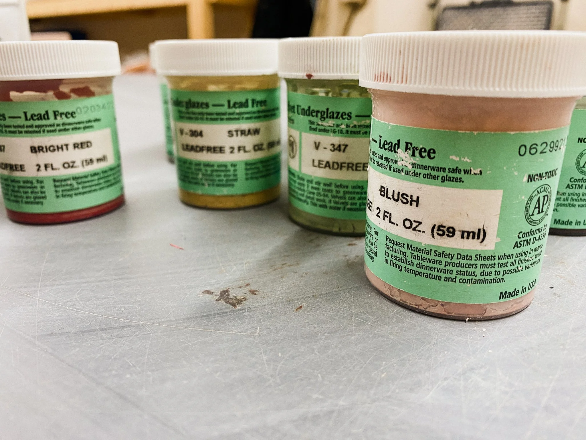 Small jars of Amaco Velvet Underglaze