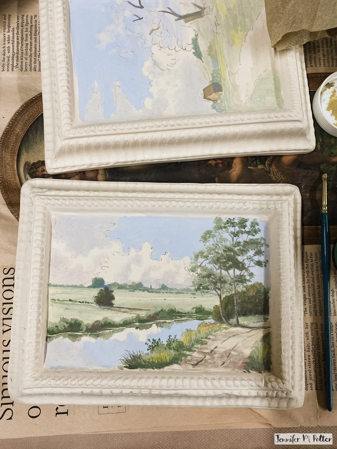 Two underglaze landscape paintings in progress