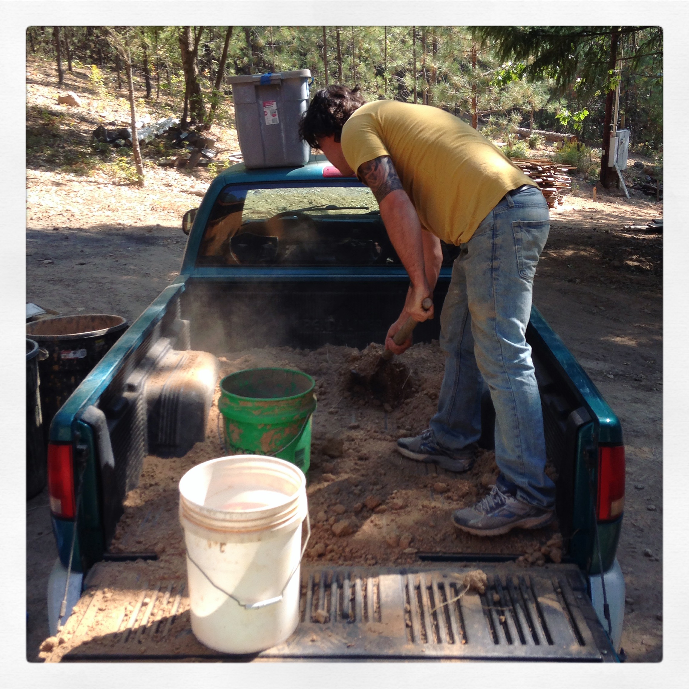 Zach Wollert helping prep clay brought back from Mendocino 