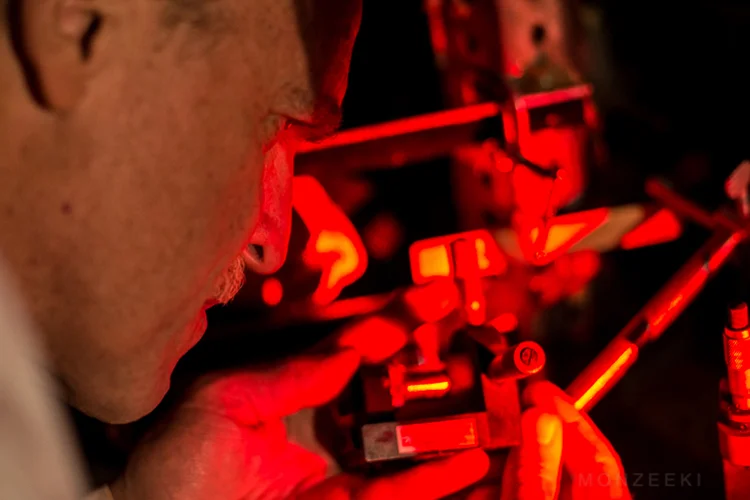 Down in the depths of his studio, Dr Laser calibrates his lasers in preparation of creating a new hologram. The beam will reflect off an image to create the two dimensional representation as similar to a photograph. However a second ‘reference’ beam is also active that creates the sense of depth, hence creating a three dimensional effect to the final image.