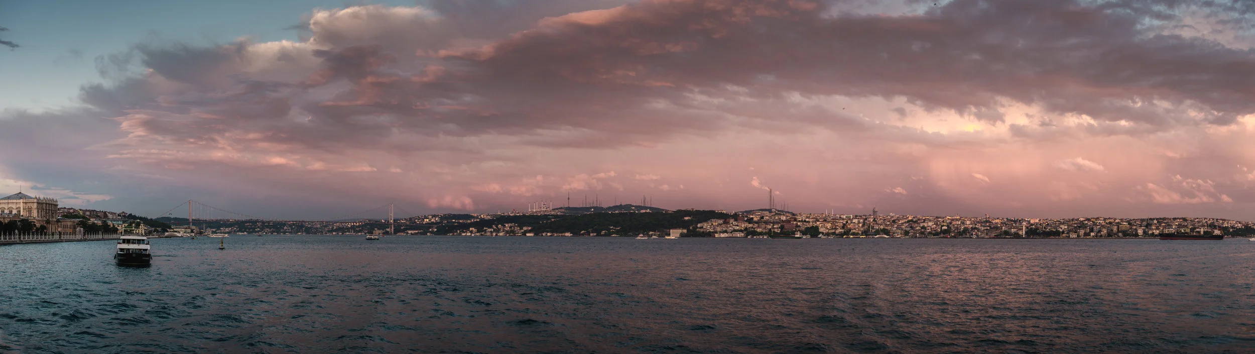 Pink dominated the sky most nights, and I loved how the blue sea was tinted with pink as well. Here you see the European continent just hanging on the left of the image, and the lit Bosphorus Bridge reaches over to the asian continent. 