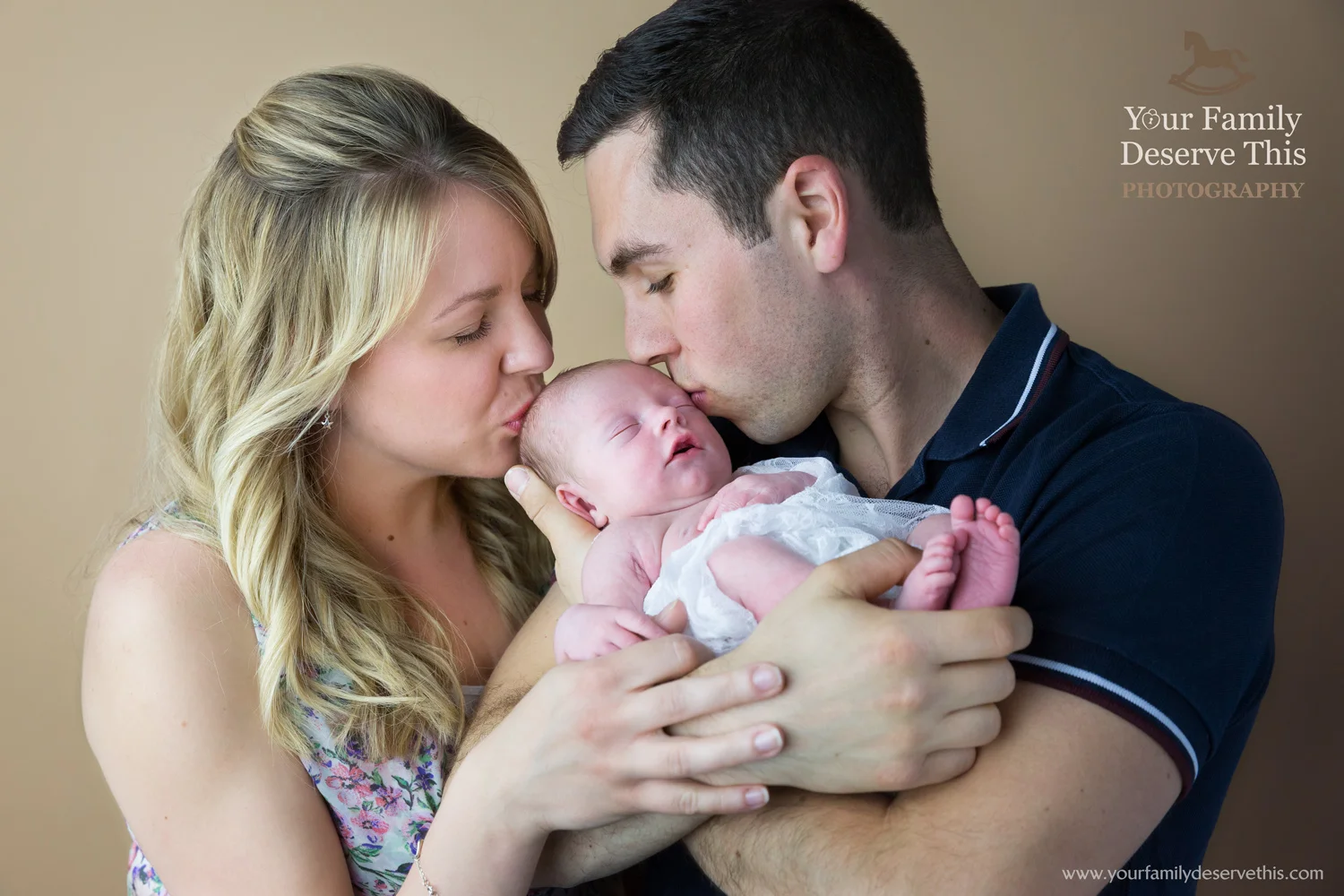 Kisses for their beautiful baby girl. Newborn Portrait Sessions with www.yourfamilydeservethis.com