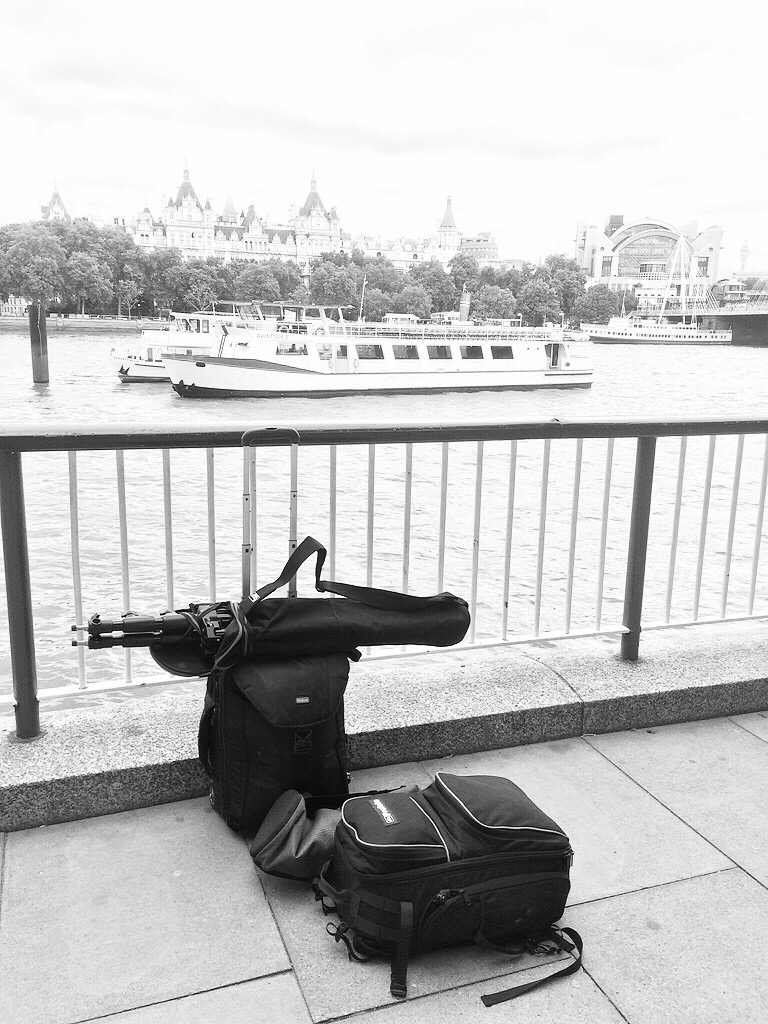 Thinktank roller loaded to the brim, Manfrotto stands, softbox and Profoto B1s in the backpack.