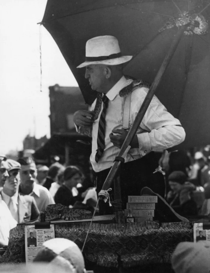 Man selling Medicine at Maxwell Street , 1930s Gelatin silver photograph. 9 5/8 x 7 1/2 inches