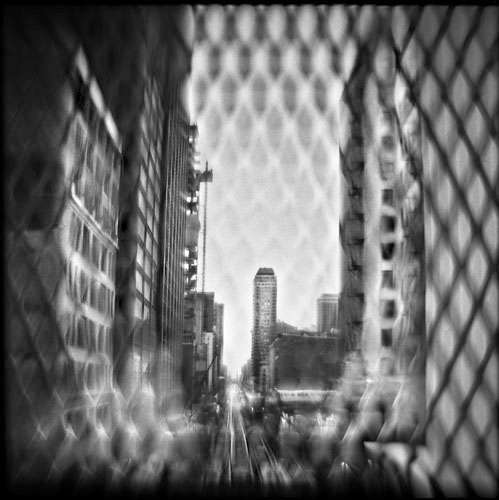 Madison and Wabash, 11:42 AM Hand-varnished, archival pigment print. 16 x 16 inches