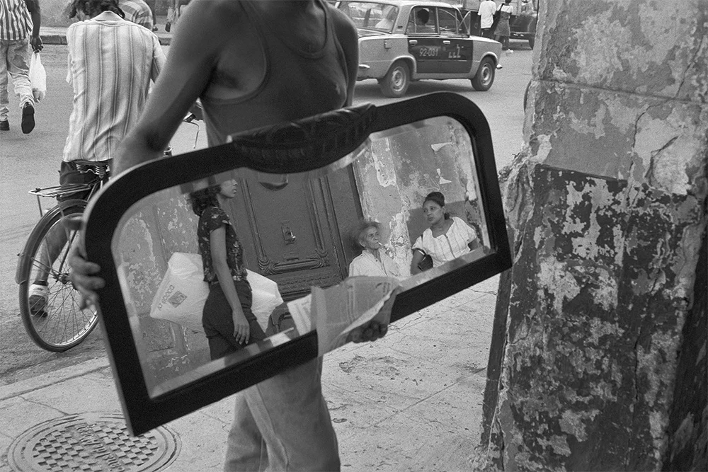 Man with the Mirror , Havana, Cuba, 1999 Archival pigment print. 13 3/8 x 20 inches
