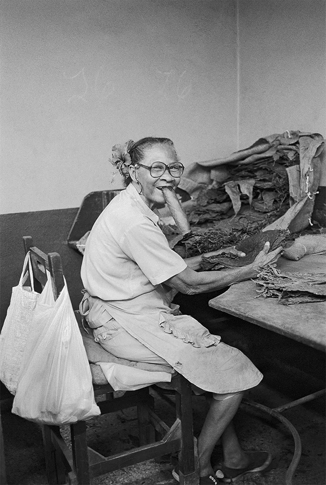Cigar Lady , Havana, Cuba, 1999 Archival pigment print. 20 x 13 3/8 inches