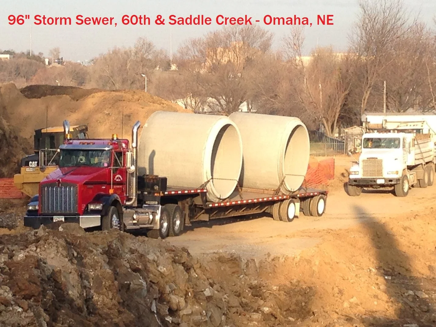 heavycivil pipeontruck.jpg