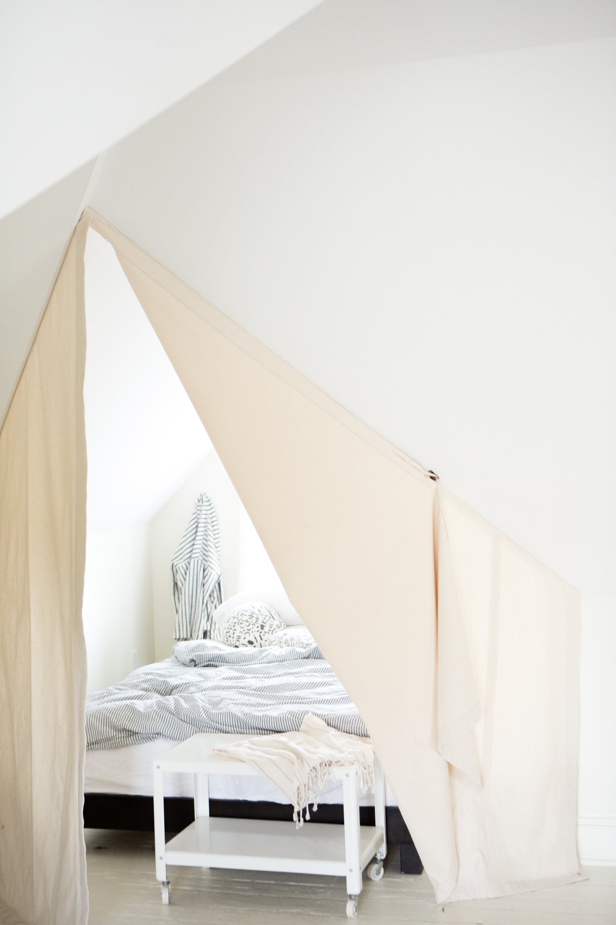 A casual guest room created in a remodeled attic. Photo by Wing Ta.